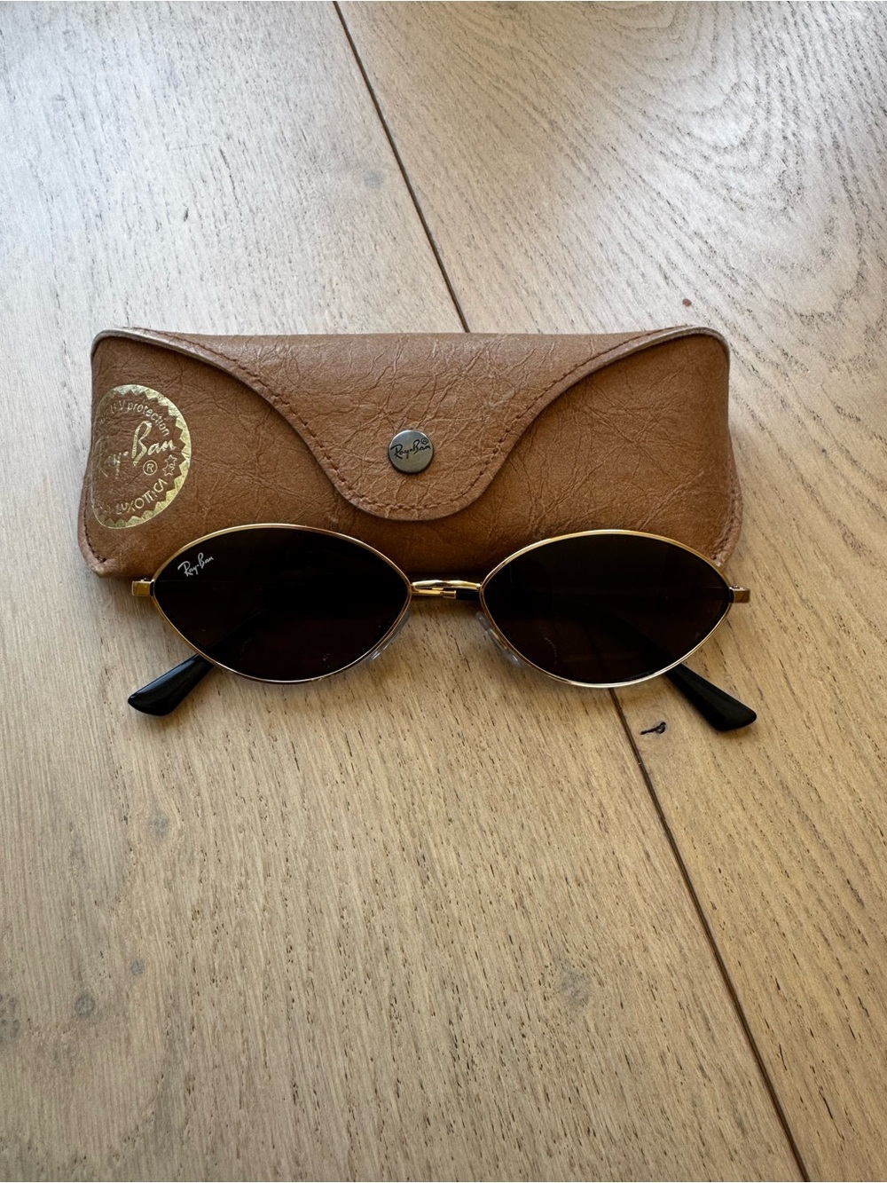 Ray-Ban Kai 56mm Oval Unisex Gold Frame Sunglasses with Brown Lenses